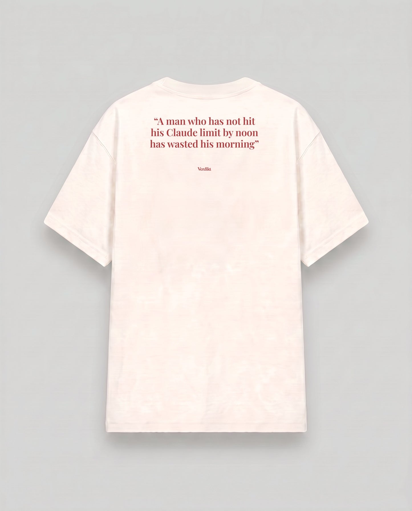 A man who has not hit his Claude limit by noon has wasted his morning - quote print - cream tee, back (grey studio)