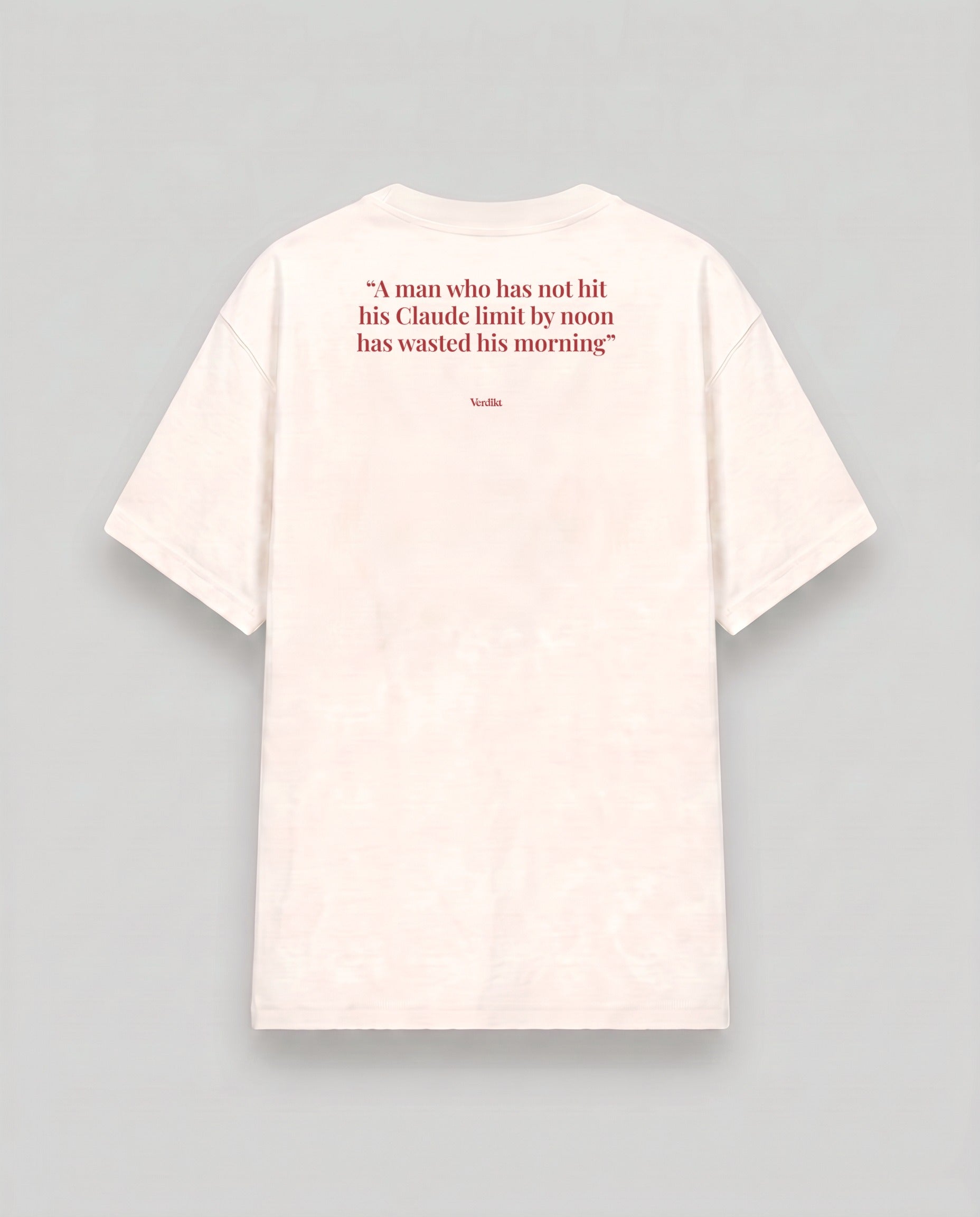 A man who has not hit his Claude limit by noon has wasted his morning - quote print - cream tee, back (grey studio)