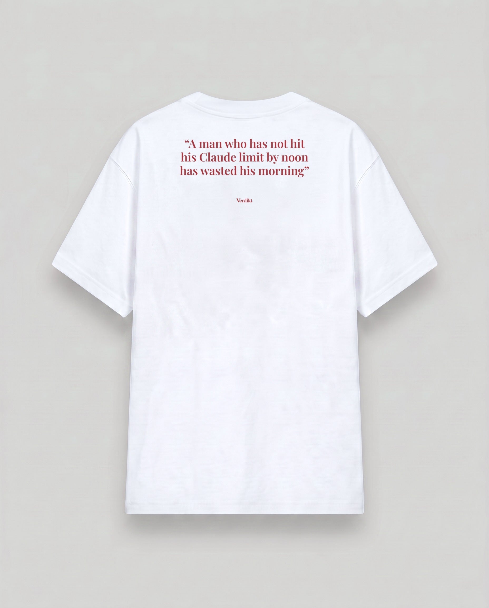 A man who has not hit his Claude limit by noon has wasted his morning - quote print - cloud white tee, back (grey studio)